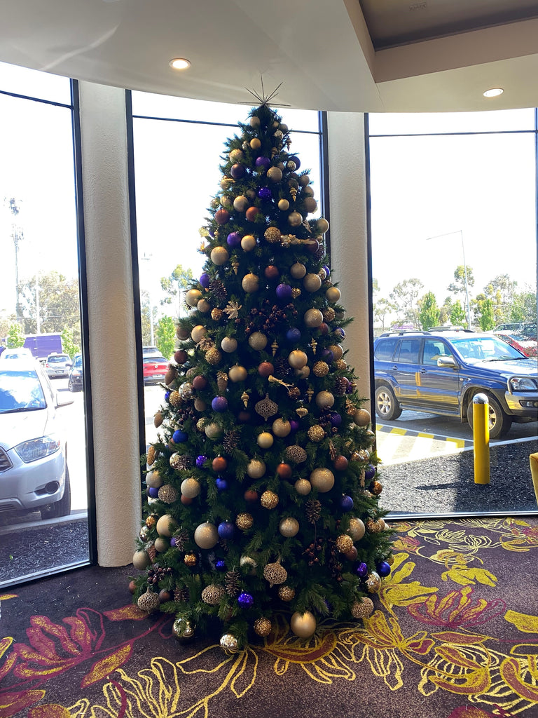 How do I book my decorated Christmas tree?
